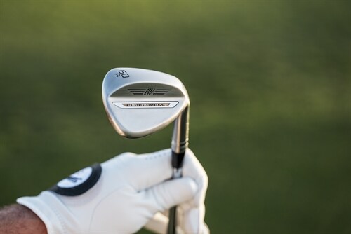 Vokey WedgeWorks A Grind wedge being held up 