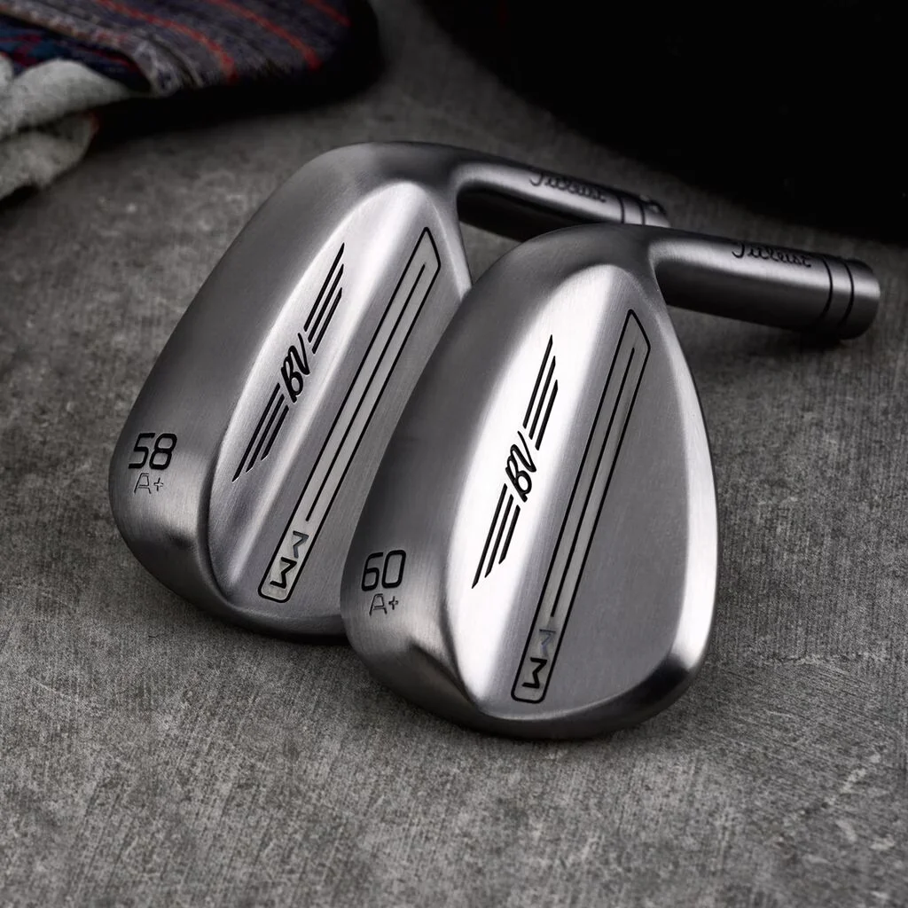 A+ Grind wedge with a raw finish, offering a sleek and smooth design for a fast turf interaction.